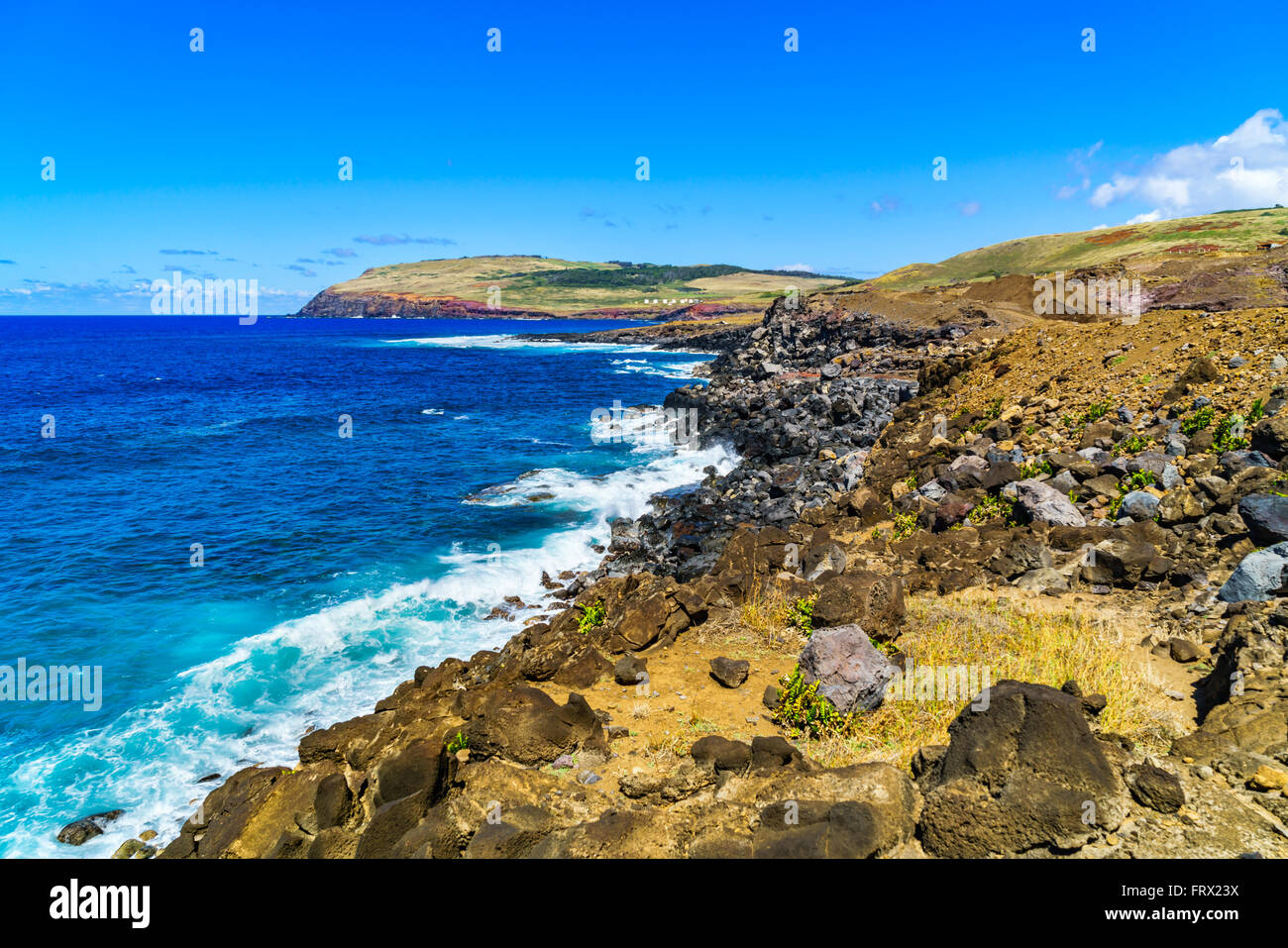 Shoreline of Easter Island with the waves of South Pacific Ocean Stock Photo