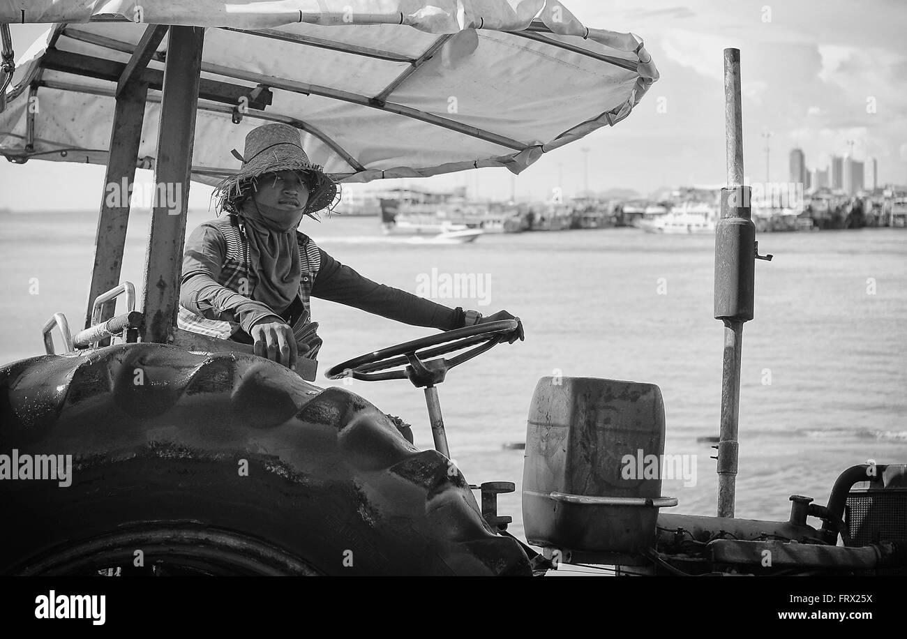 Local boat yard workers around the pier. Stock Photo