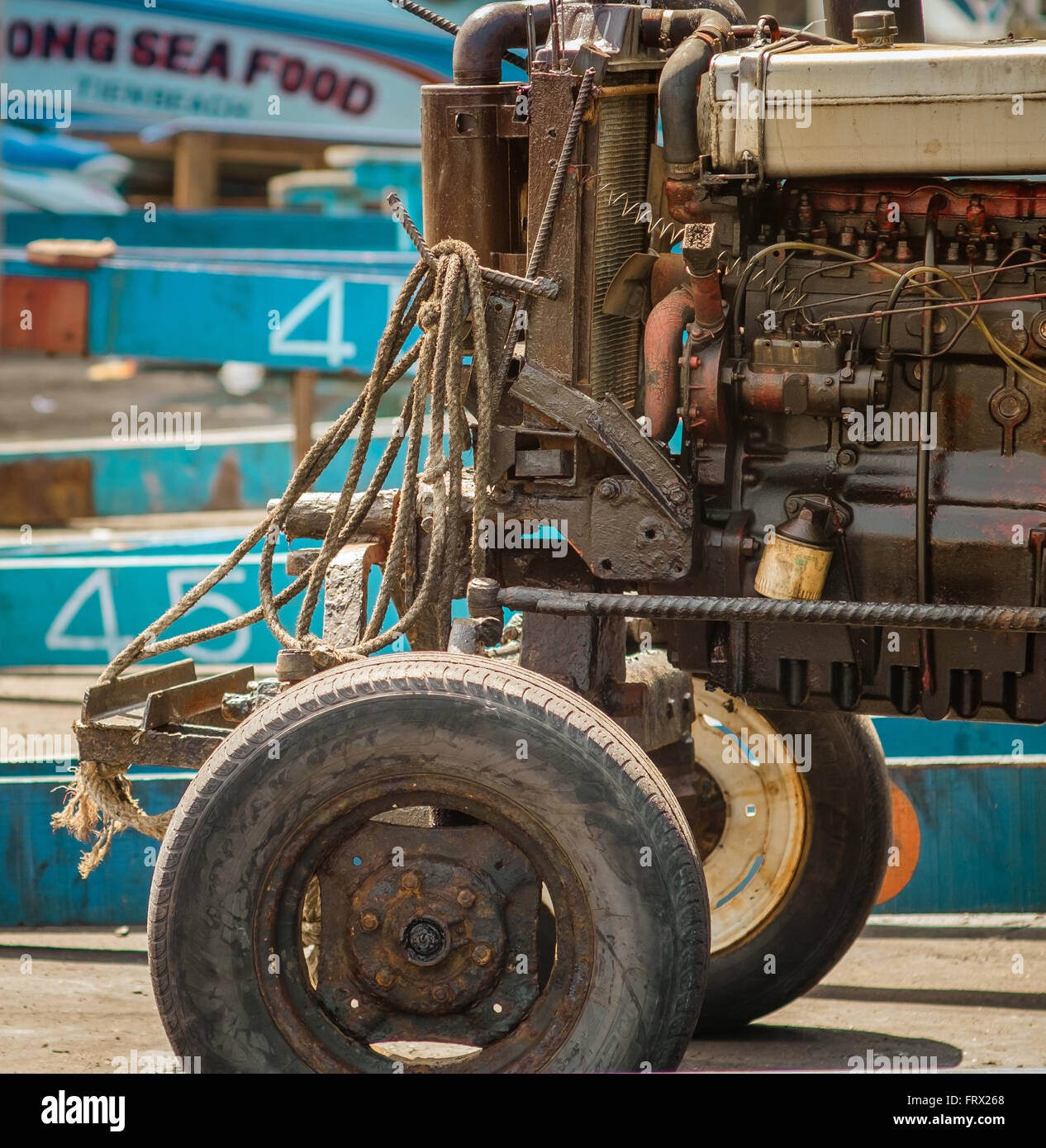 Local boat yard workers around the pier. Stock Photo