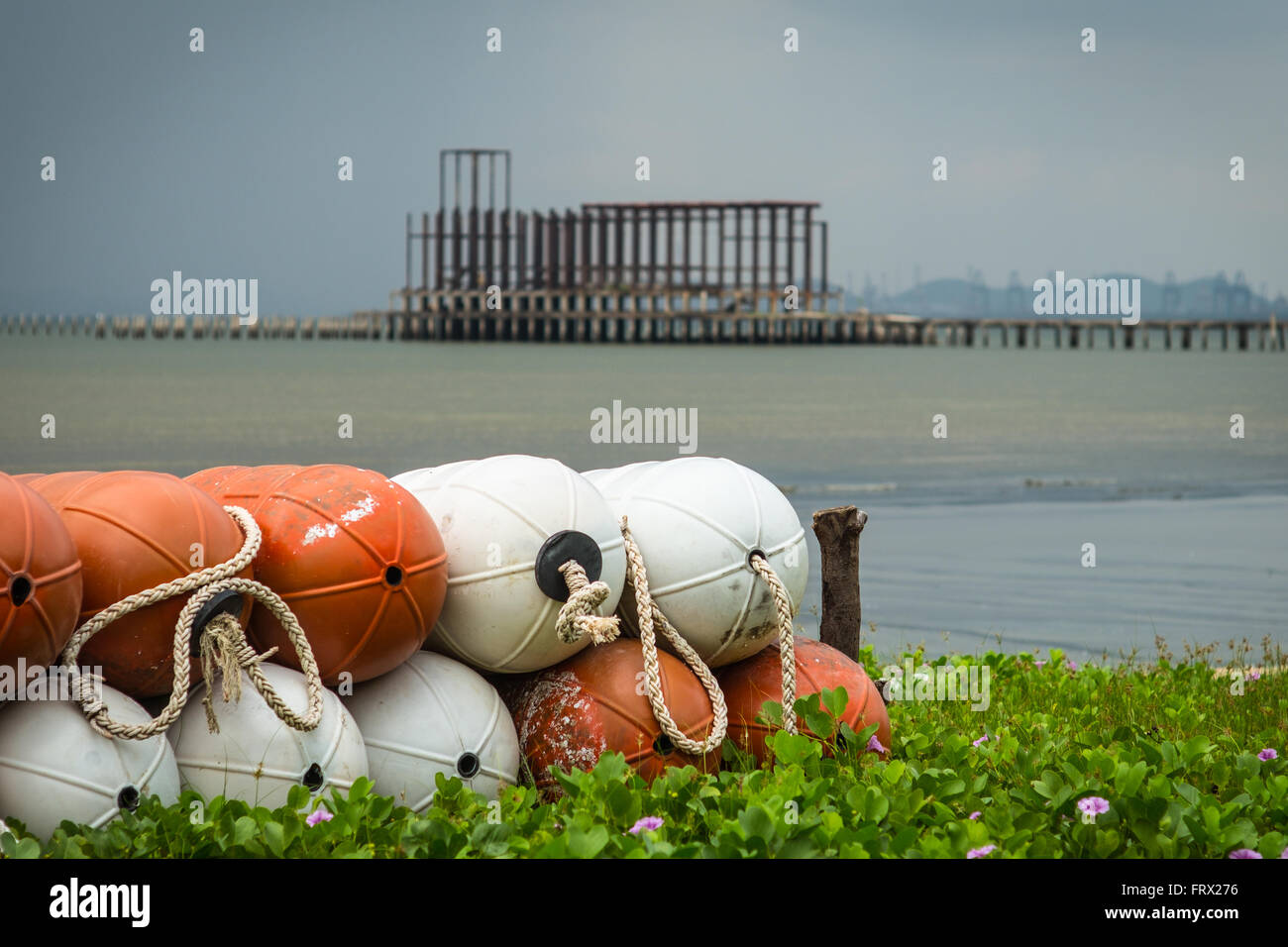 Local boat yard workers around the pier. Stock Photo