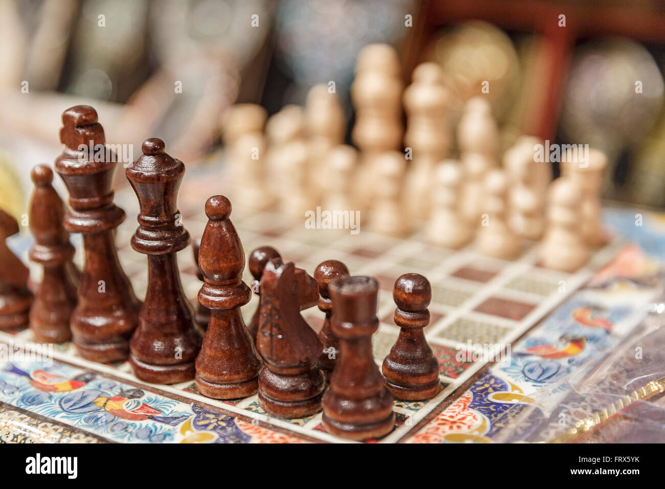 Ancient wooden chess pieces on an old chessboard Stock Photo - Alamy