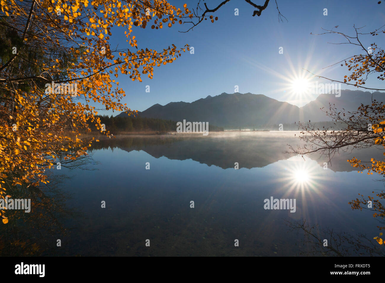 Sunrise, view over Barmsee lake to the Soiern mountains and Karwendel ...