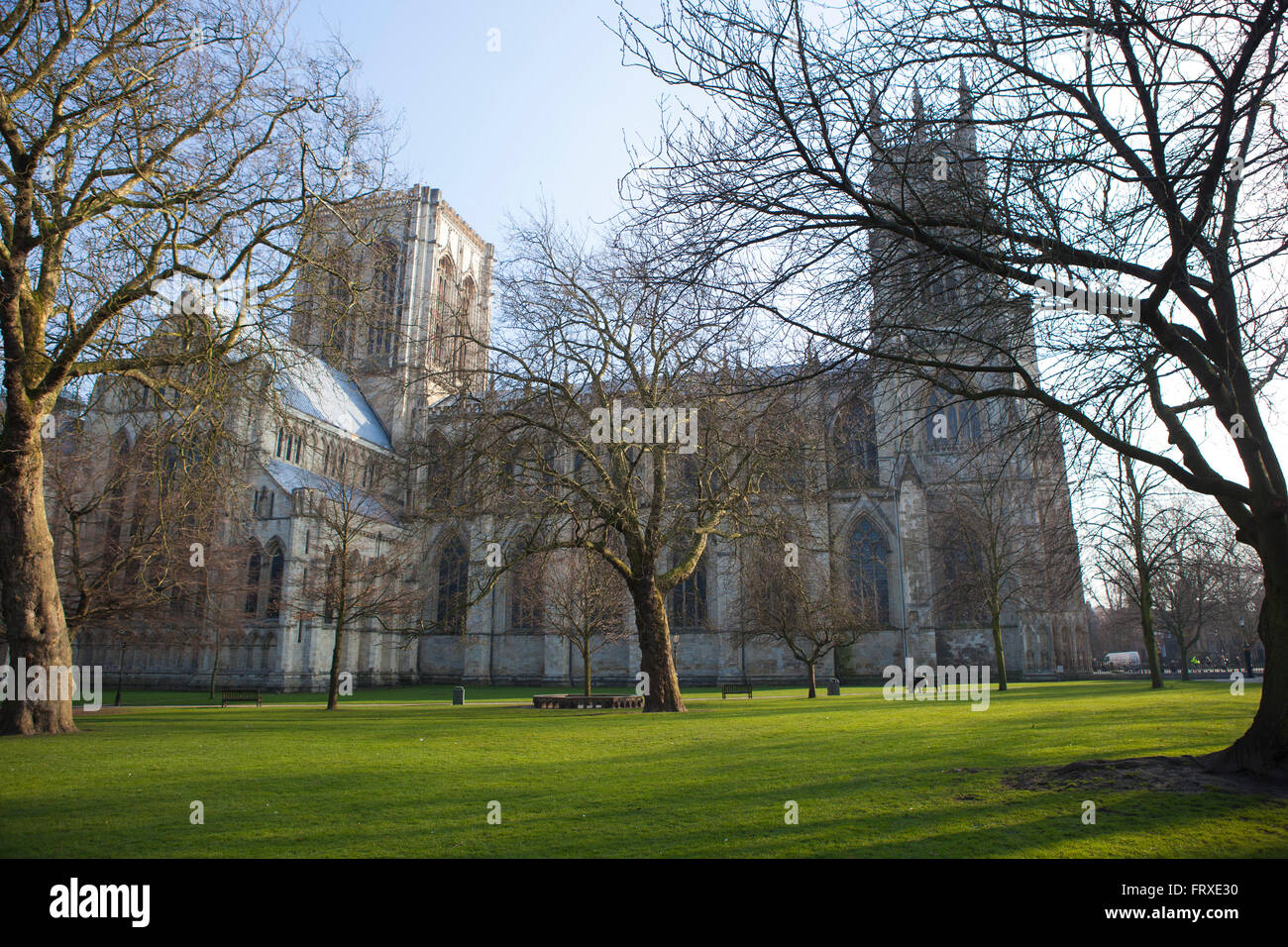 York minster or cathedral showing its amazing and intricate stone work in the bright sunshine