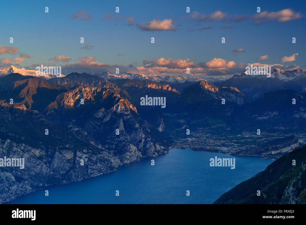 Lake Garda with Riva and view to Lake Garda range, Adamello range, Presanella range, Brenta range and valley of Sarca, Ventrar, Monte Baldo, Lake Garda range, Trentino, Italy Stock Photo