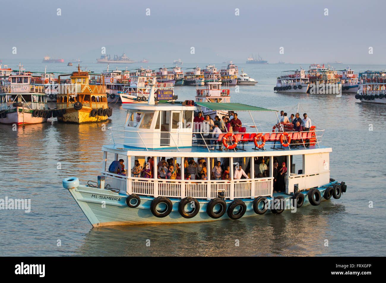 Tour boats in harbor near the Gateway to India, Mumbai, Maharashtra, India Stock Photo