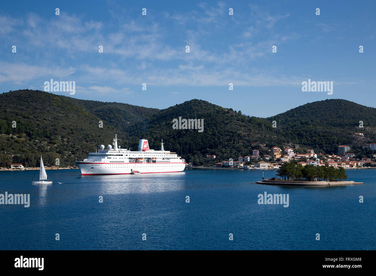 Cruise ship MS Deutschland, Reederei Peter Deilmann, at anchor in Vathi harbor, Vathi, Ithaca, Ionian Islands, Greece Stock Photo