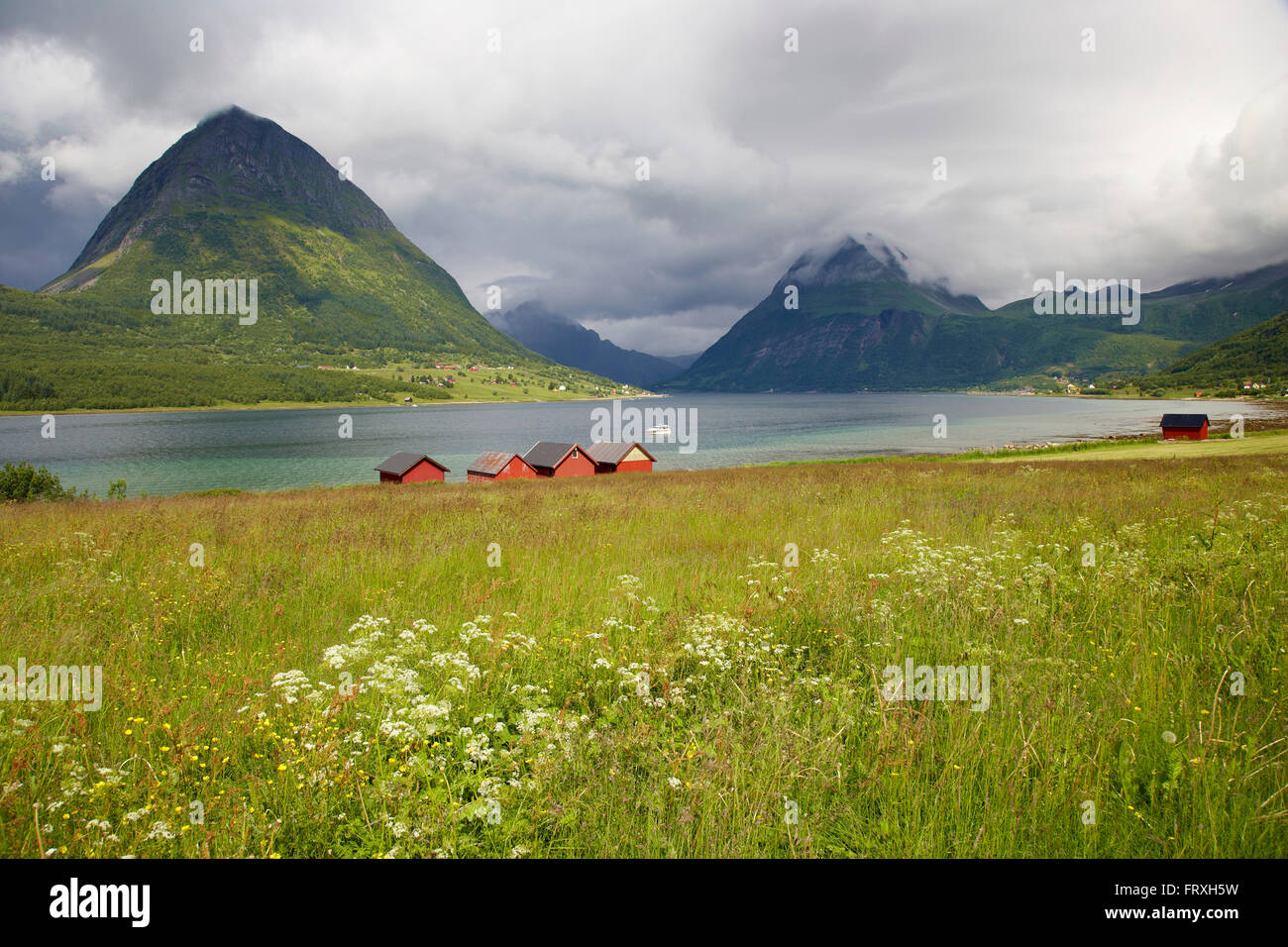 View across the fjord, Aldersund, near Haugland at Aldra Isle, Province of Nordland, Nordland, Norway, Europe Stock Photo