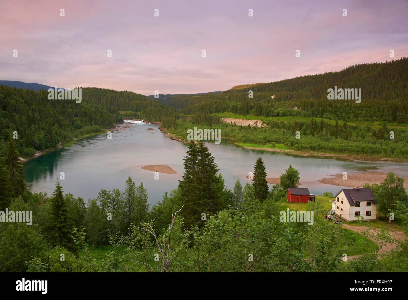 View over forest and houses at the river Ranaelva near Mo i Rana, Province of Nordland, Nordland, Norway, Europe Stock Photo
