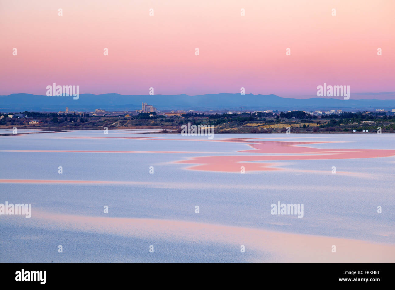 View over the Étang de Bages et de Sigean towards Narbonne with Saint-Just-et-Saint-Pasteur Cathedral in the background, Narbonne, Dept. Aude, Roussillon, France, Europe Stock Photo