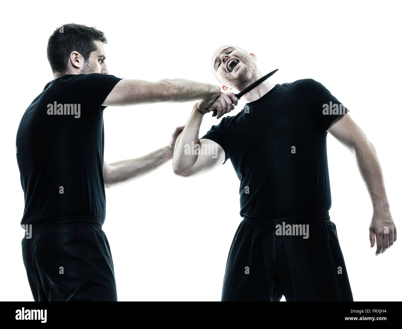 two caucasian men krav maga fighters fighting isolated silhouette on