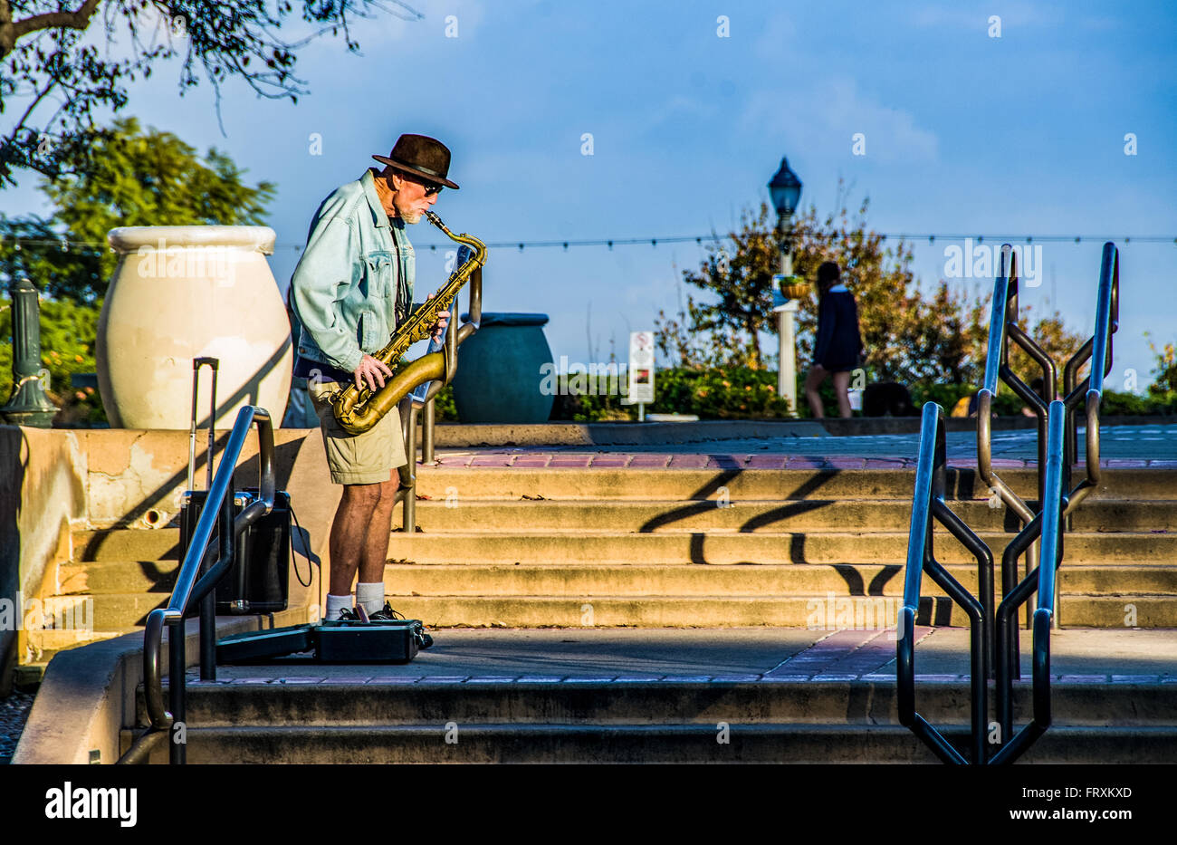 Senior saxophone player in Balboa Park in San Diego, CA, USA Stock Photo