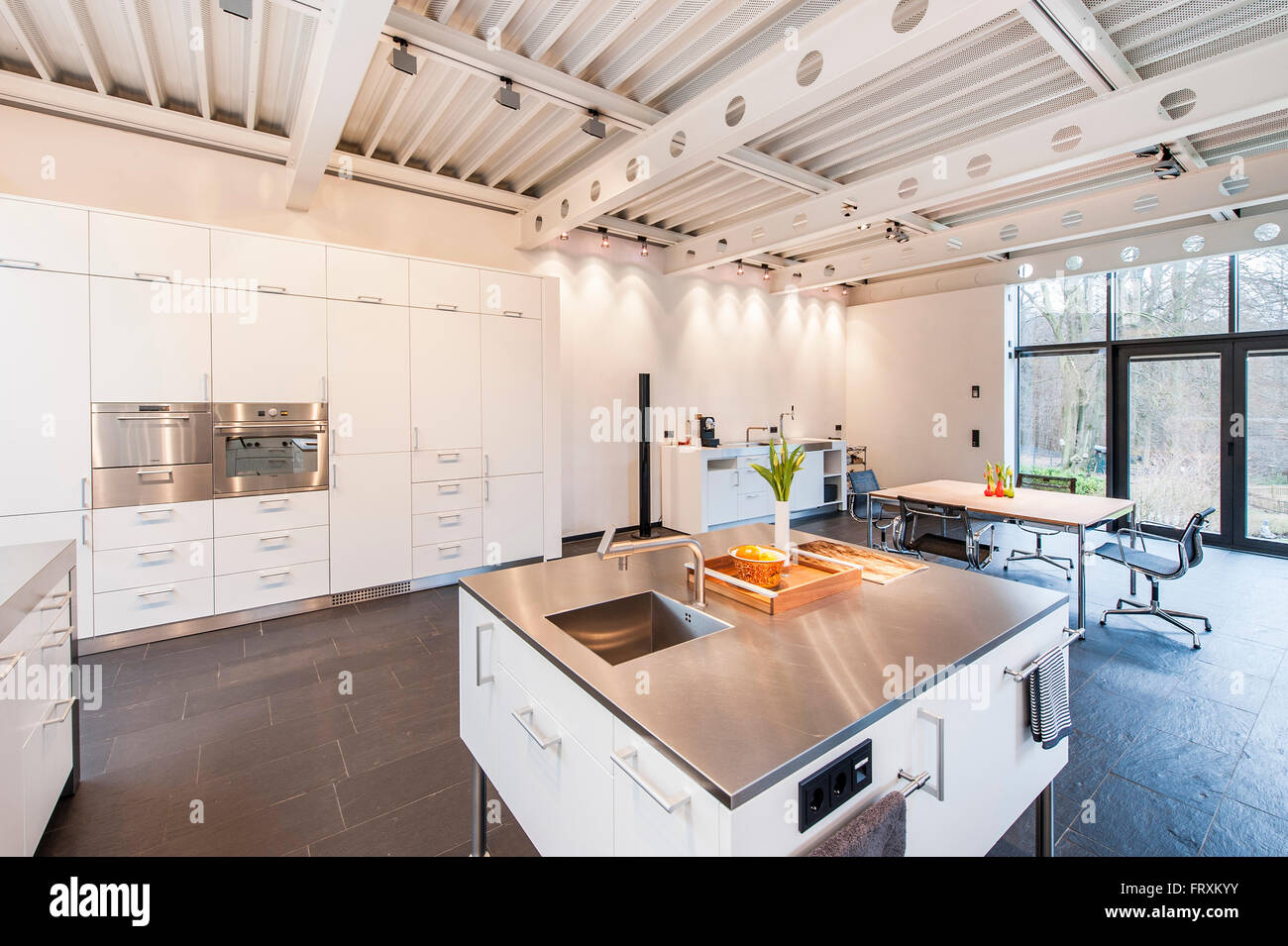 Open plan kitchen inside a Bauhaus villa, Sauerland, Germany Stock Photo