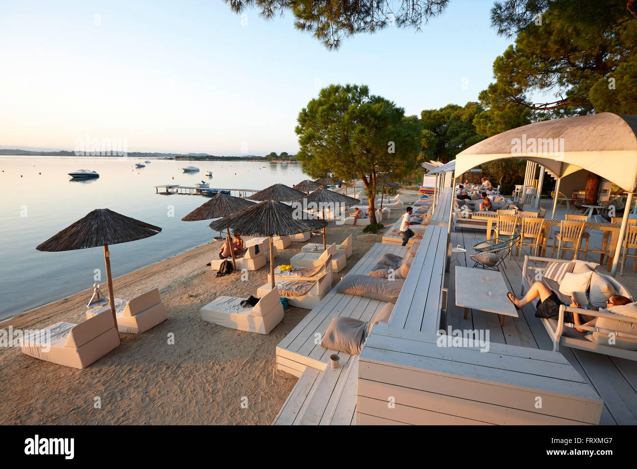 Beach bar of a hotel in the evening, Vourvourou, Sithonia, Chalkidiki, Greece Stock Photo