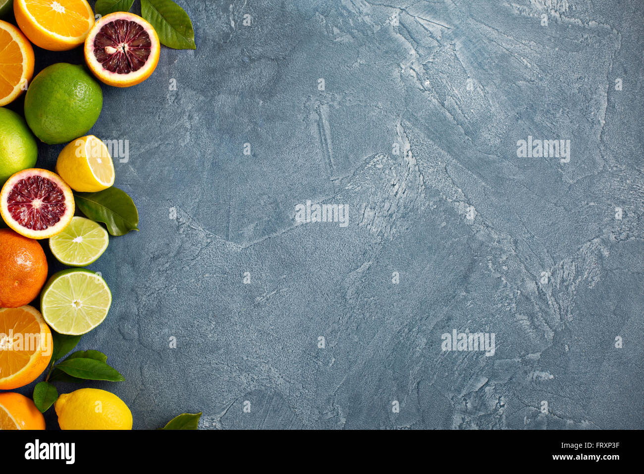 Citrus fruits background with oranges, limes and lemons Stock Photo - Alamy