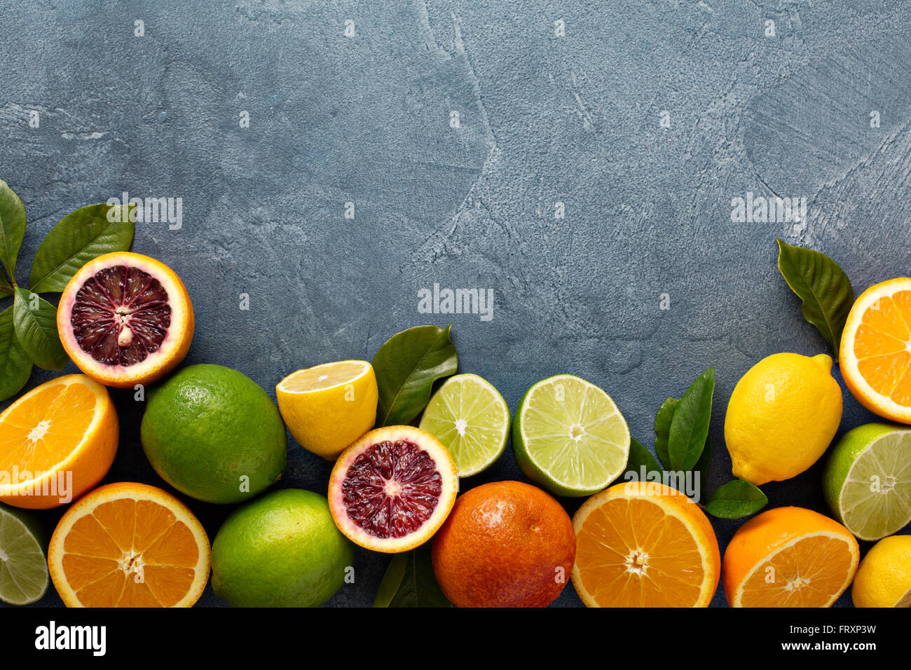 Citrus fruits background with oranges, limes and lemons Stock Photo - Alamy