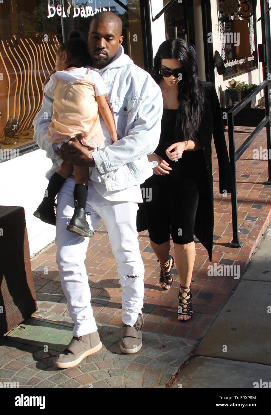 Kim Kardashian and Kanye West shopping at luxury baby boutique Bel Bambini  Featuring: Kim Kardashian, Kanye West, North West Where: Beverly Hills,  California, United States When: 21 Feb 2016 Stock Photo - Alamy