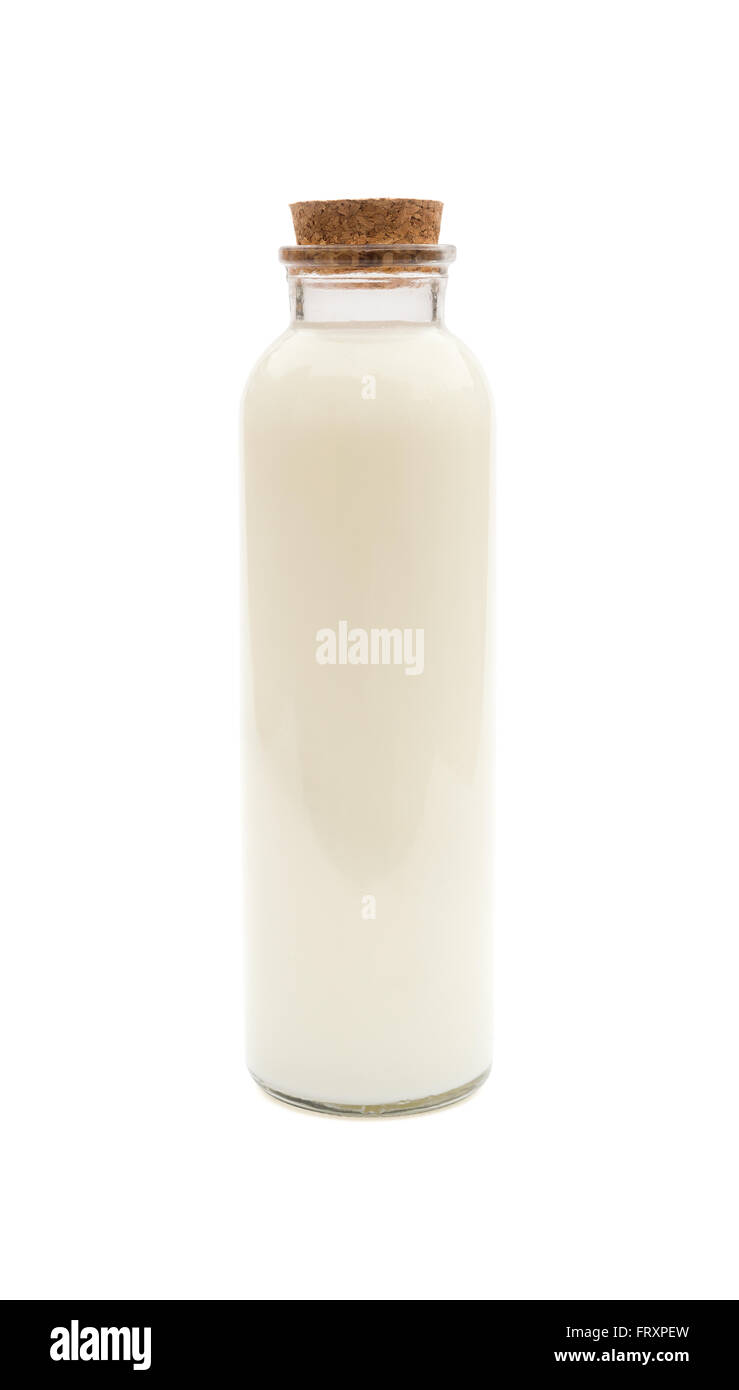 bottle of milk with wood plug on white with clipping path Stock Photo