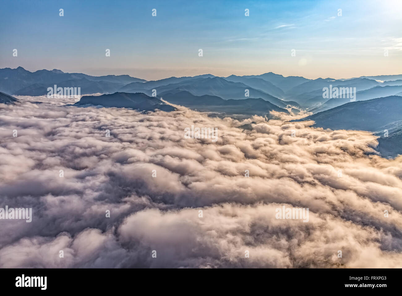 Mountain misty clouds aerial Stock Photo - Alamy