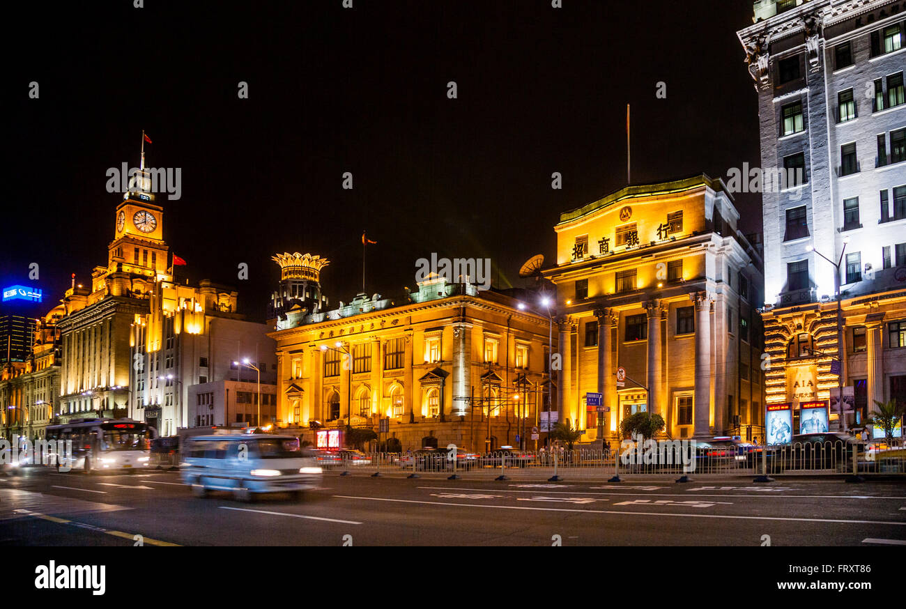 China, Shanghai, nightview of the Bund, with Customs House, Bank of Communications Building and the former Russo-Chinese Bank Stock Photo
