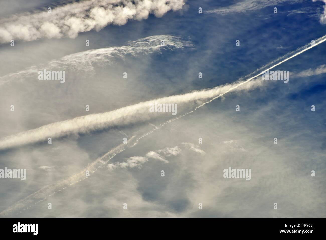 Contrails of jet aircrafts in the blue sky, Germany Stock Photo