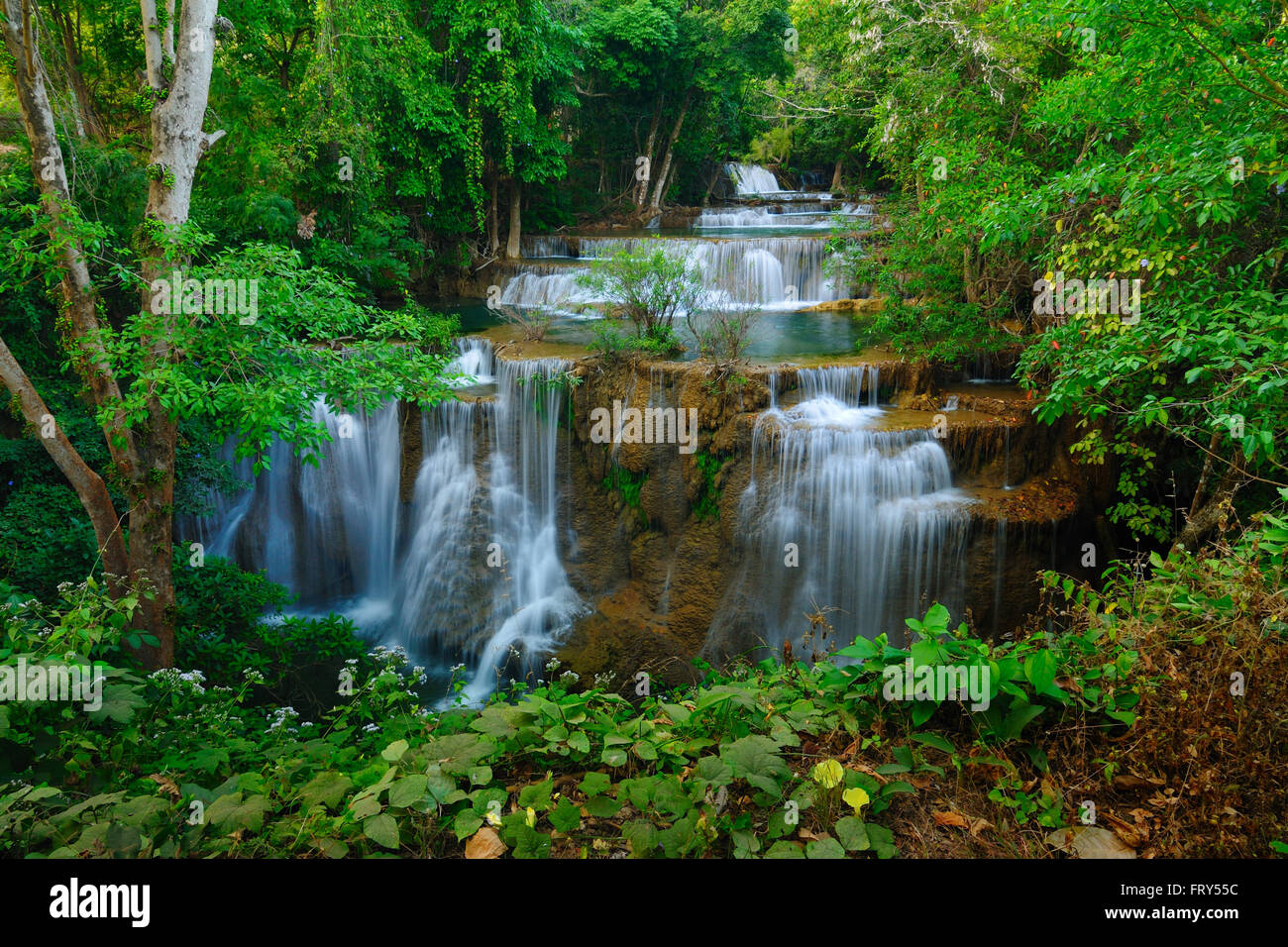 Deep forest Waterfall in Kanchanaburi, Thailand Stock Photo - Alamy