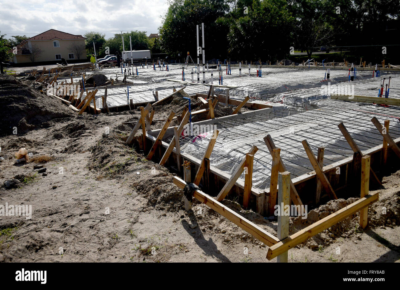 March 23, 2016 - North Lauderdale, FL, USA - fl-Mediterania-north-lauderdale-1-ng  :  Construction begins at Mediterania, a community of 58 townhomes in North Lauderdale at West McNab Road and southwest 81st Ave, where the developer, Capstone Communities ,  is building the last 14 townhomes. The original builder started the community and finished 44 units before losing the site as part of the housing downturn. Capstone Communities acquired the land and will finish the rest of the project. The two- and three-bedroom townhomes start at $229,900, ideal for first-time buyers. (Credit Image: © Sun- Stock Photo