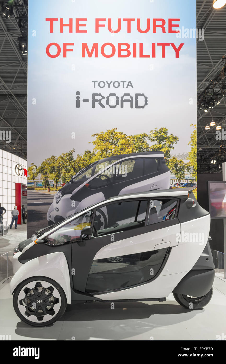 Manhattan, New York, USA. 23rd Mar, 2016. The Toyota i-ROAD three-wheeled two-seater fully electric vehicle is on display at the New York International Auto Show 2016, at the Jacob Javits Center. This car seats the two people in tandem. This was Press Preview Day one of NYIAS, and the Trade Show will be open to the public for ten days, March 25th through April 3rd. © Ann Parry/ZUMA Wire/Alamy Live News Stock Photo