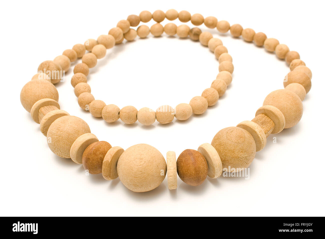 Necklace made of yellow wooden balls isolated on white Stock Photo Alamy