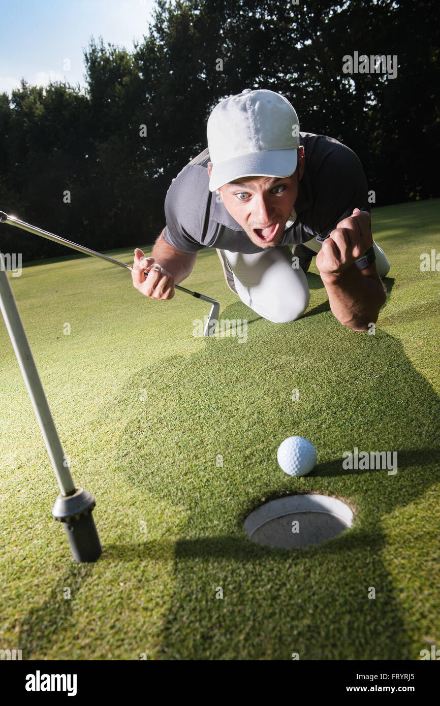 Golfer stunned because he missed his last swing Handsome golfer lying