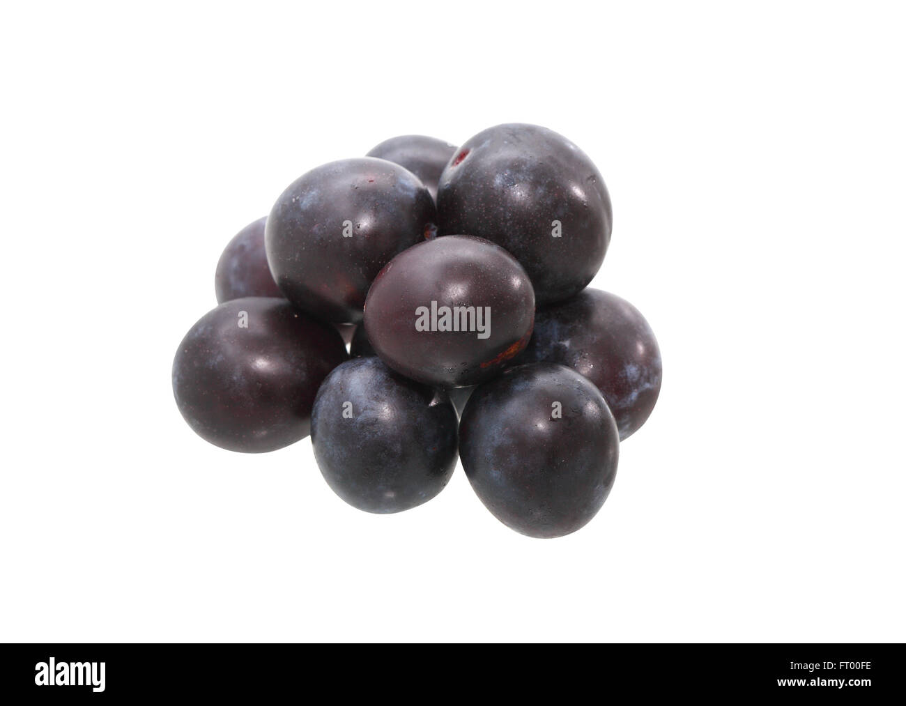 Heap of plum fruits on white background. Clipping path is included Stock Photo