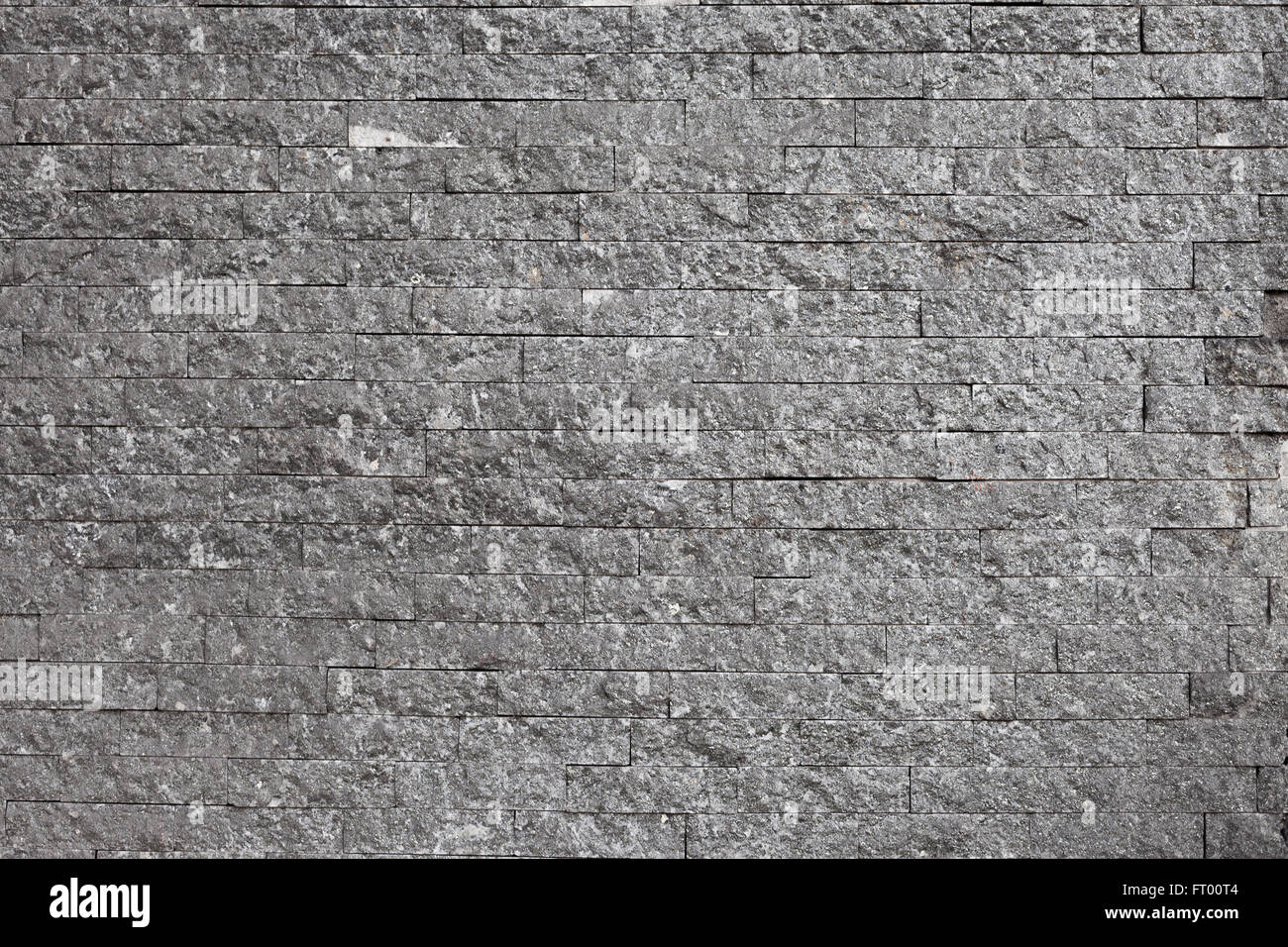 Old gray brick wall high detail Stock Photo