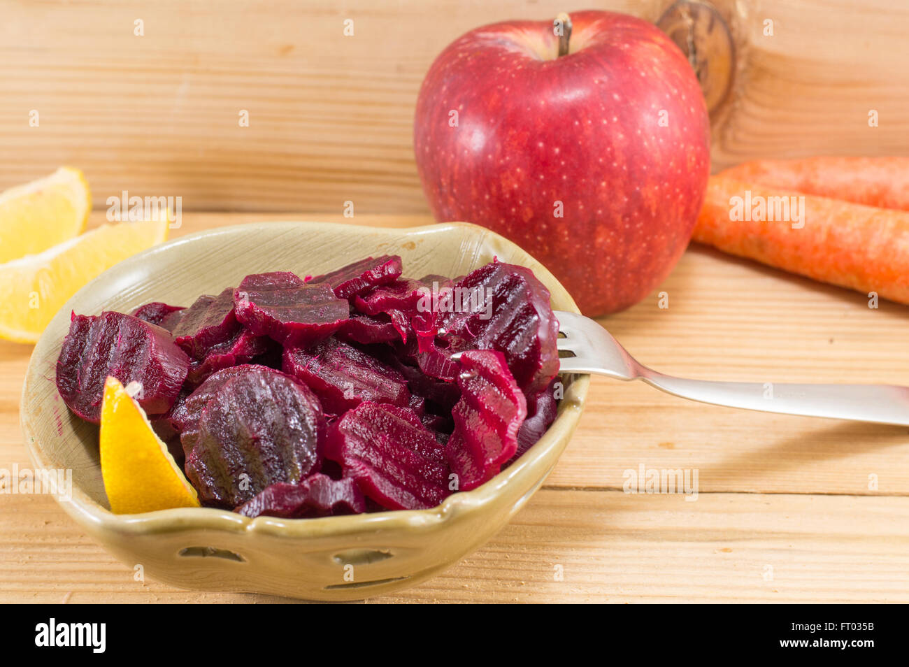 Fresh chopped beets in a bowl. Healthy salad Stock Photo