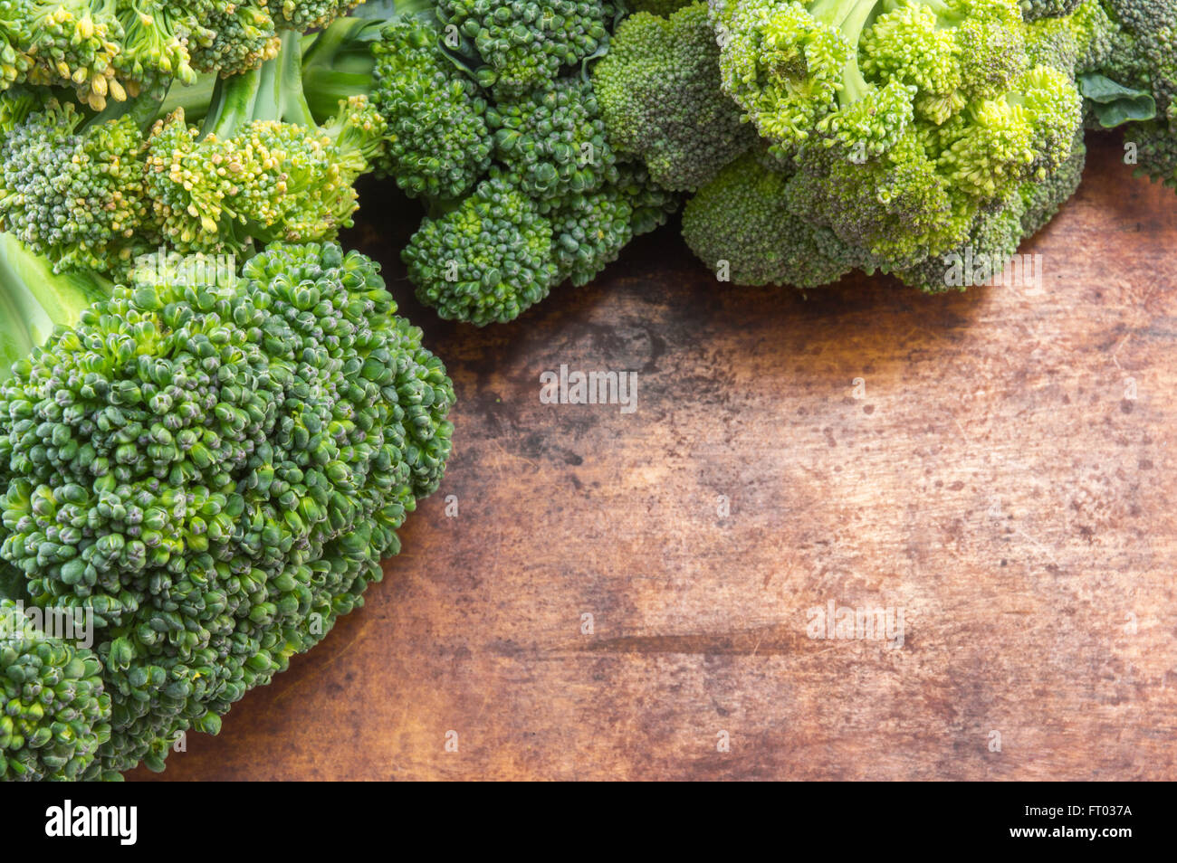 Fresh broccoli on the wooden table Stock Photo