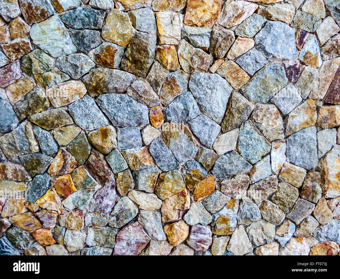 granite stone wall a very hard type of rock that is used in buildings
