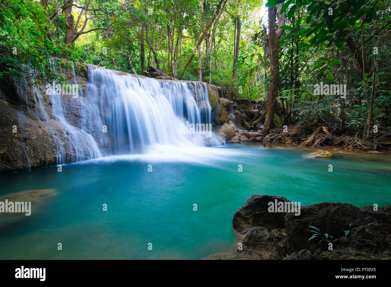 Deep forest Waterfall in Kanchanaburi, Thailand Stock Photo - Alamy