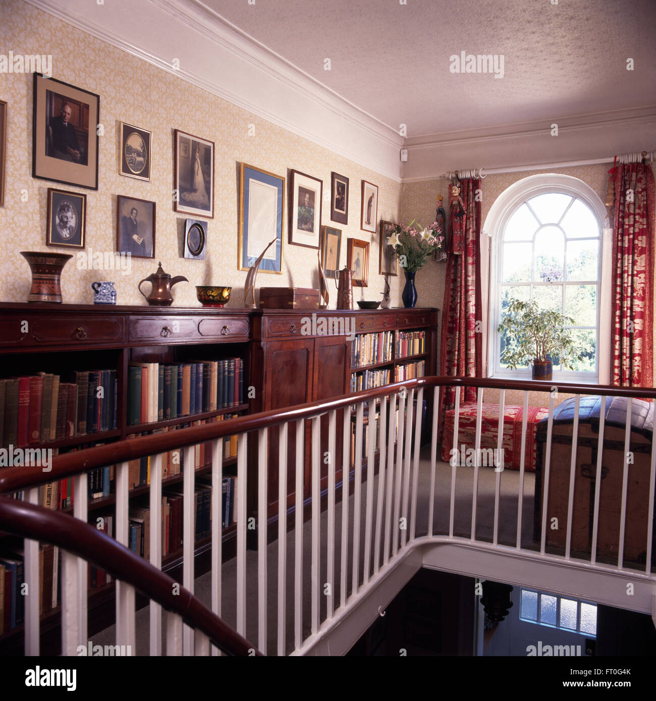 Mahogany Hand Rail And Painted Banisters On Landing Of Georgian