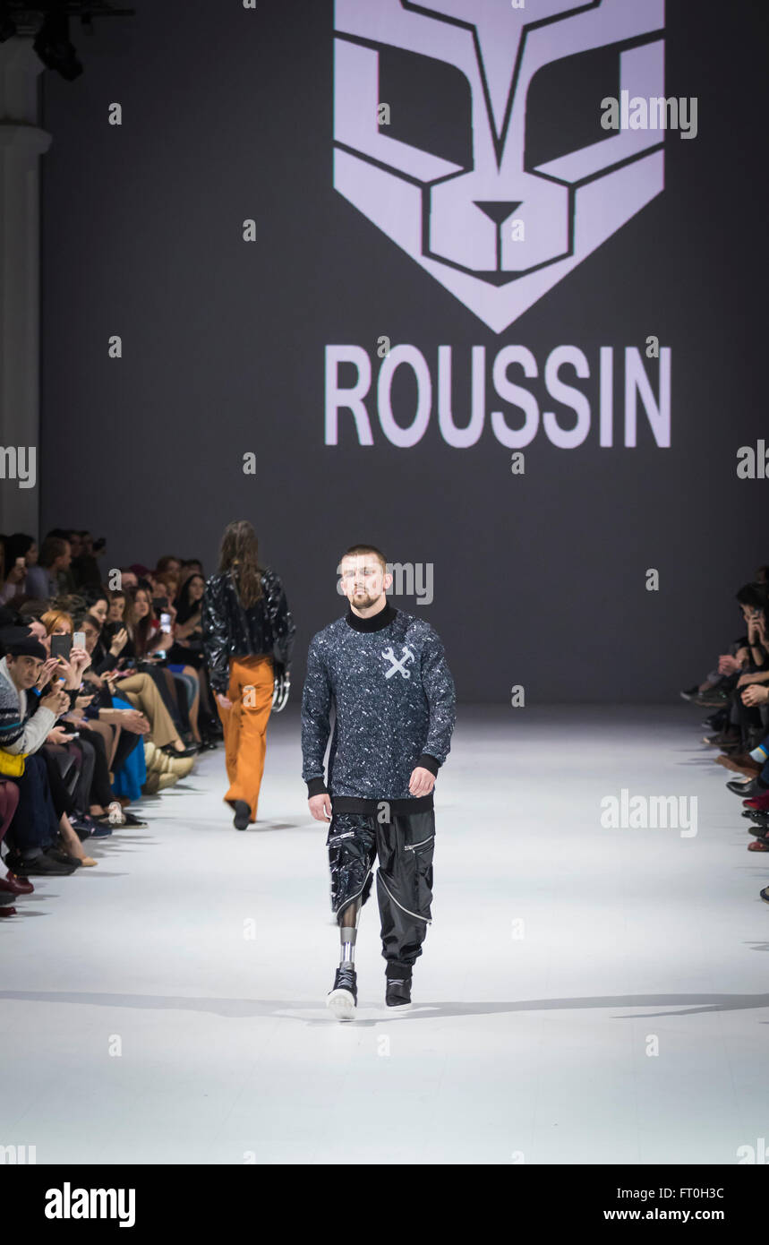 KYIV, UKRAINE - MARCH 21, 2016: Disabled war veteran walks on the catwalk during Fashion Show ROUSSIN by Sofia Rousinovich as pa Stock Photo