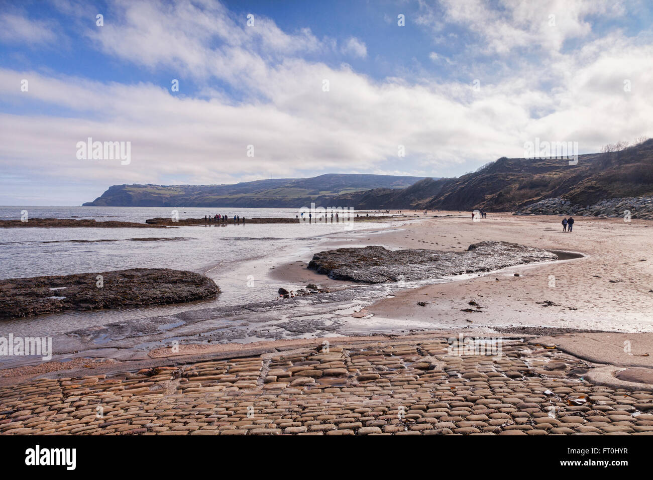 The beach at low tide at Robin Hood's Bay, North Yorkshire, England, UK