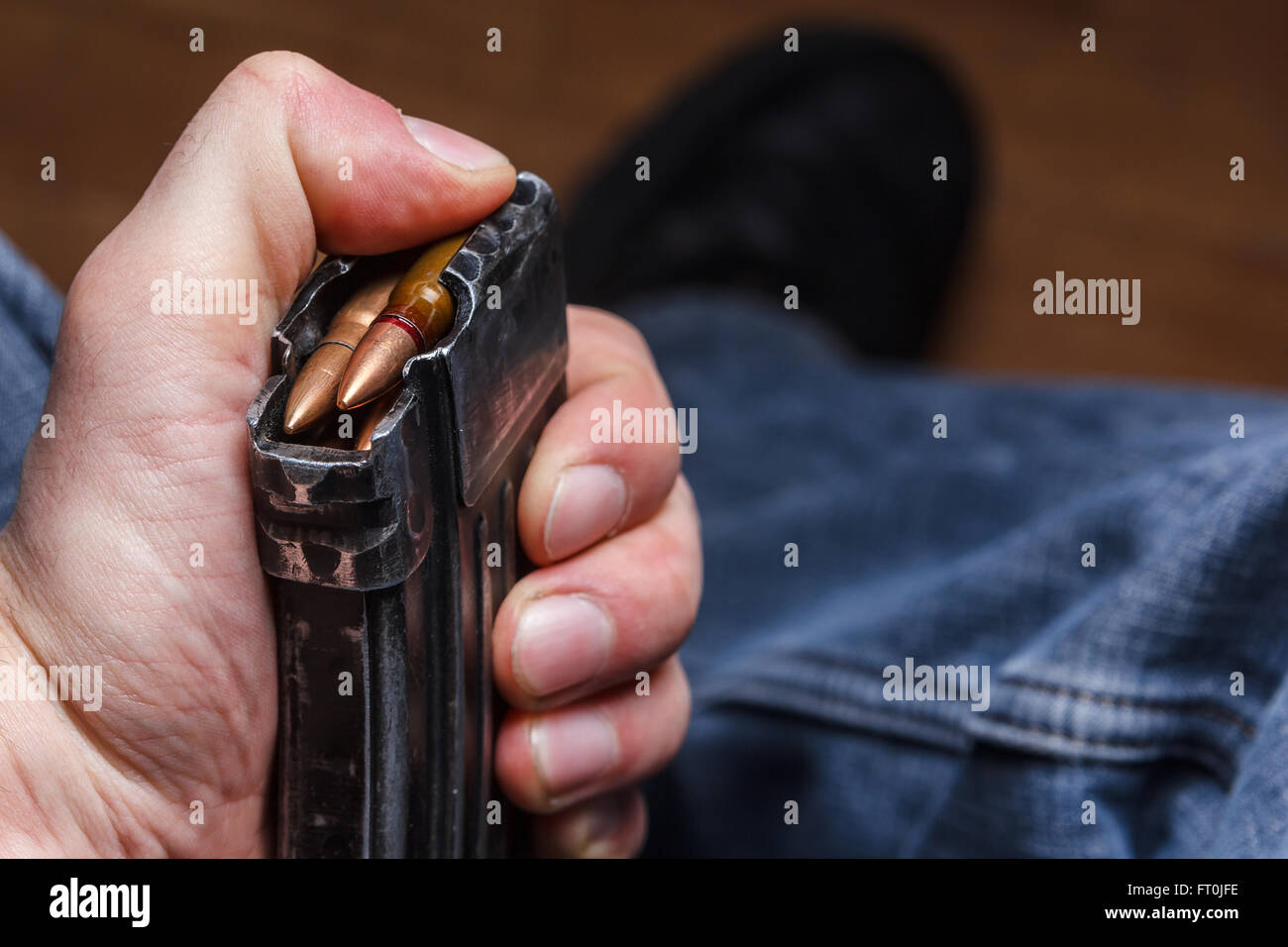 Loading 5.56 ammo magazine for machine guns Stock Photo
