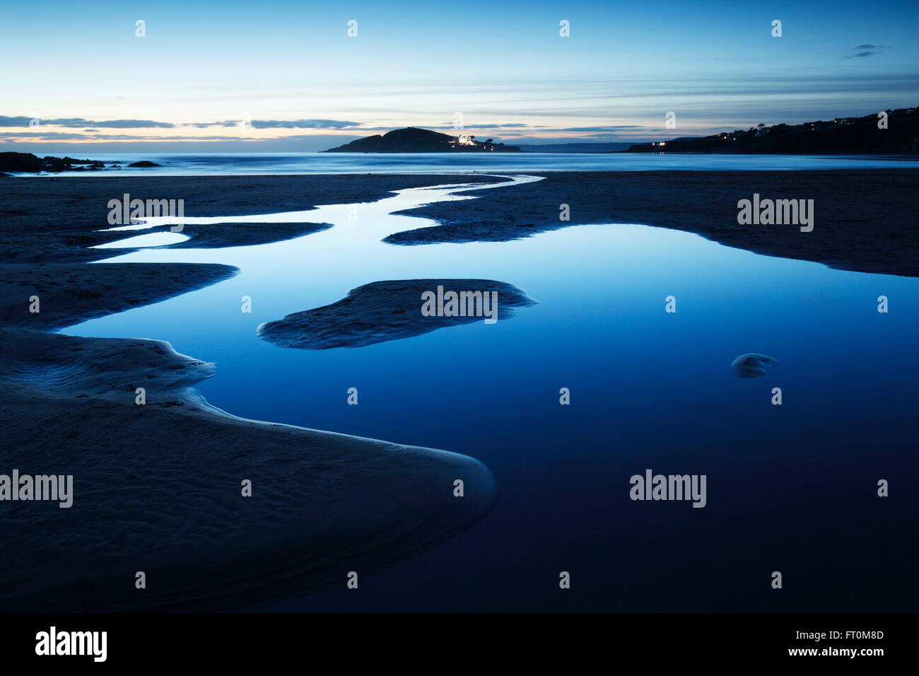 Bantham Sand beach at dusk. Burgh Island in the distance. South Hams. Devon. UK. Stock Photo