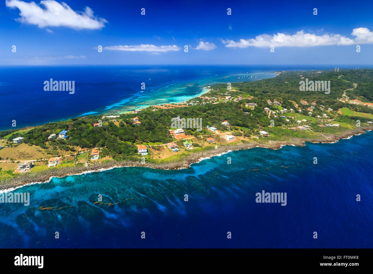 Aerial panoramic view of Roatan island and the surrounding vibrant ...