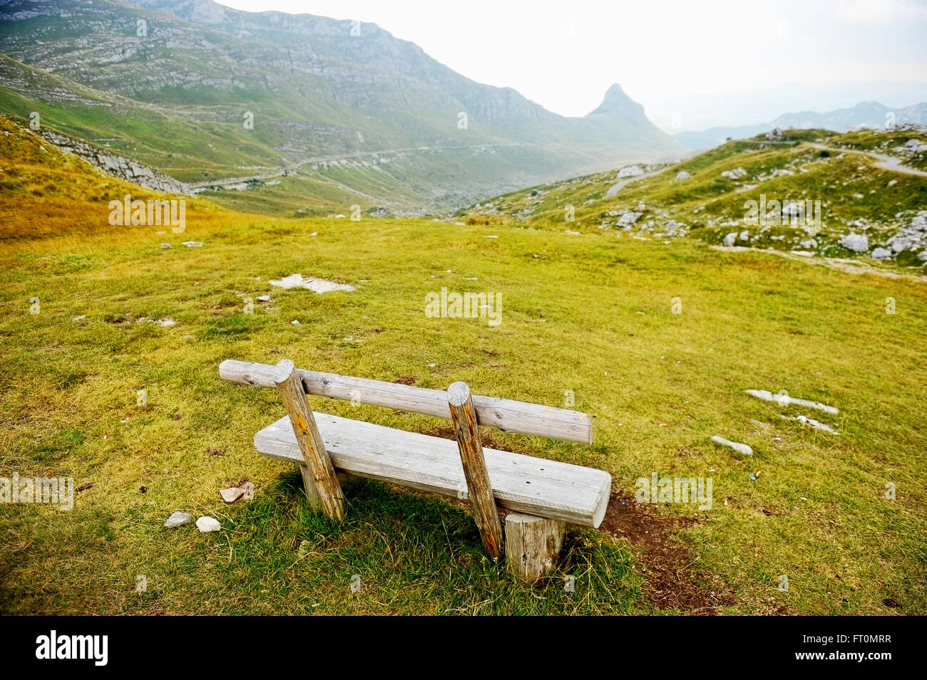 Empty wooden bench on Sedlo Pass in Durmitor National Park in Montenegro Stock Photo