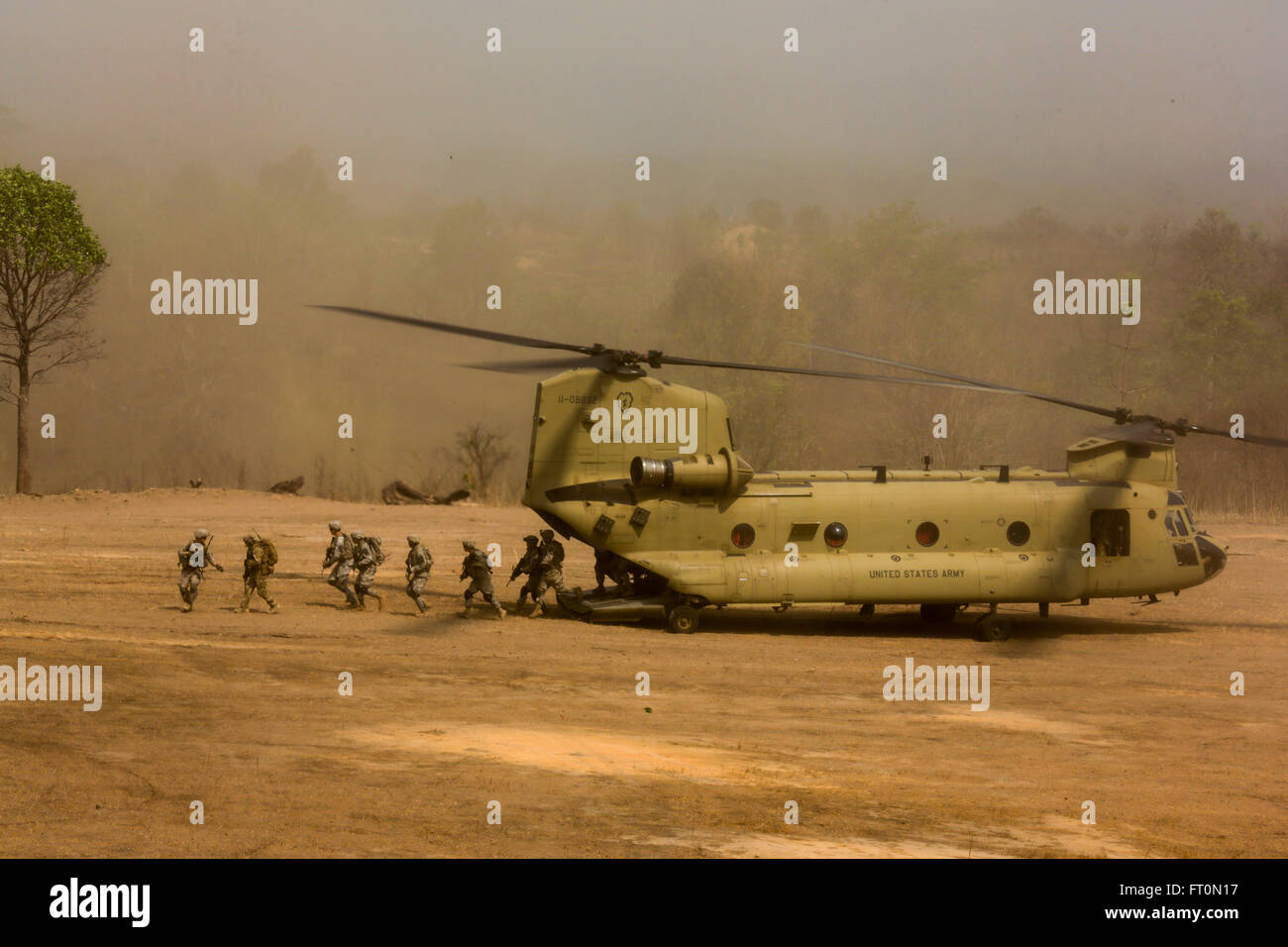 A U.S. Army CH-47 Chinook is used to transport Soldiers during a combined arms live fire exercise at Ban Chan Khrem, Thailand, during exercise Cobra Gold, Feb. 19, 2016. Cobra Gold is a multinational training exercise developed to strengthen security and interoperability between the Kingdom of Thailand, the U.S. and other participating nations. (U.S. Marine Corps Combat Camera photo by Lance Cpl. Eryn L. Edelman/Released) Stock Photo