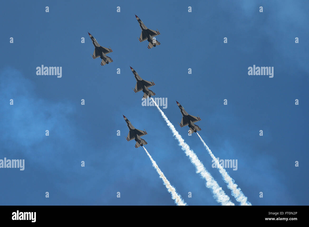 The Thunderbirds Pilots Perform The 5 card Loop During A Practice 