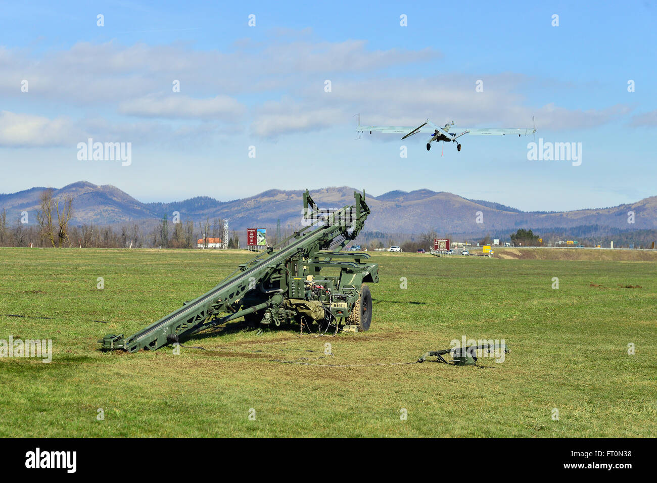 An RQ7B Shadow unmanned aircraft system assigned to 54th Brigade Engineer Battalion, 173rd Airborne Brigade, launches from a nitrogen launcher at Aeroclub Postonja in Slovenia, March 2, 2016, during the Exercise Rock Sokol. Exercise Rock Sokol is a bilateral training exercise between U.S. Soldiers assigned to 173rd Airborne Brigade and the Slovenian Armed Forces, focused on small-unit tactics and building on previous lessons learned, forging the bonds and enhancing readiness between allied forces. The 173rd Airborne Brigade is the U.S. Army's Contingency Response Force in Europe, providing rap Stock Photo