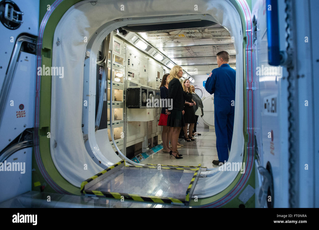 Dr. Jill Biden, wife of Vice President Joe Biden, left, is seen inside a mockup of the International Space Station, Wednesday, March 2, 2016  during a tour of the Space Vehicle Mockup Facility at NASA's Johnson Space Center in Houston, Texas.  Dr. Biden traveled to Houston to welcome home astronaut Scott Kelly, who is returning to Houston after a year long mission aboard the International Space Station. Stock Photo