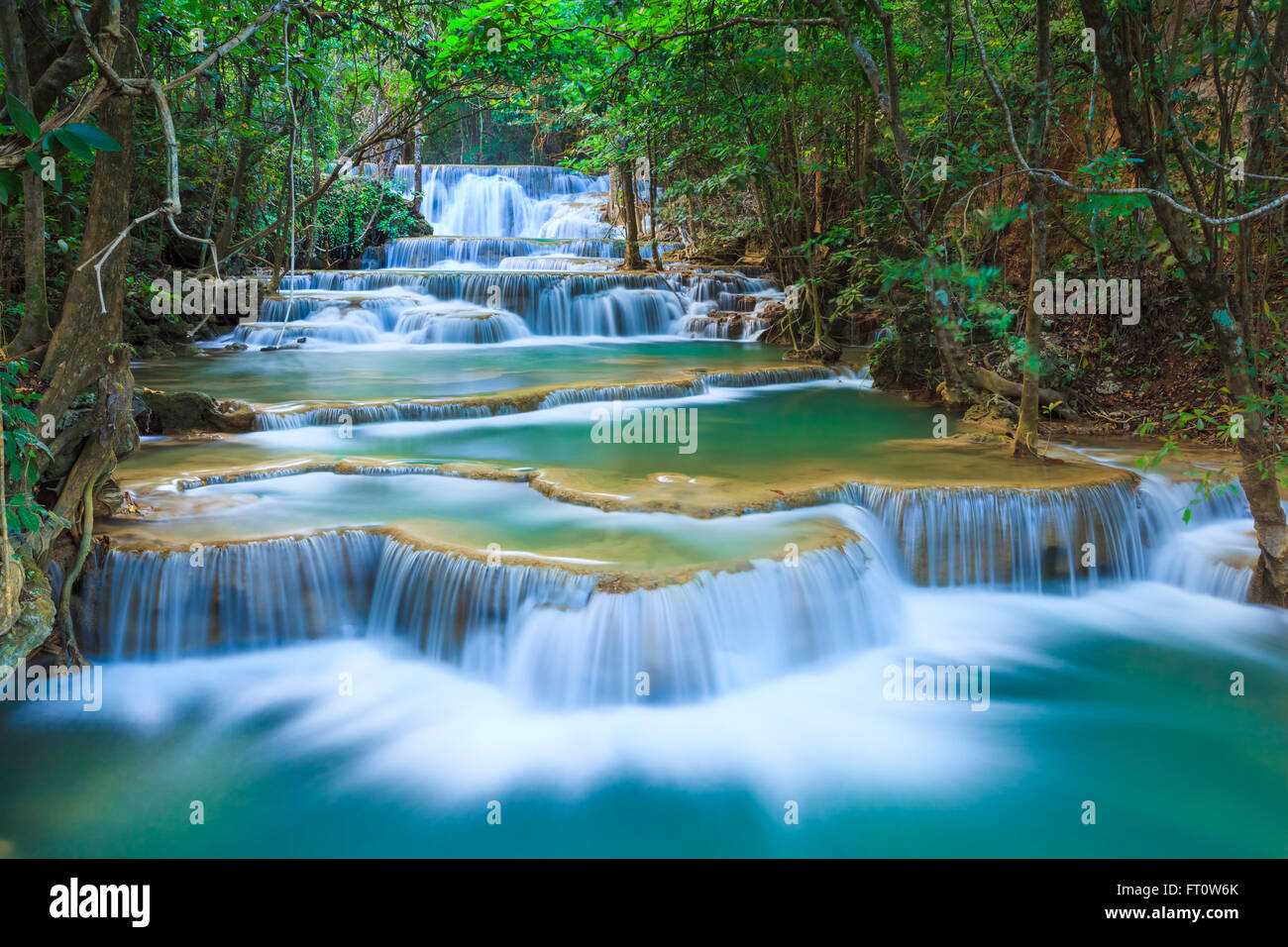 Deep forest Waterfall in Kanchanaburi, Thailand Stock Photo - Alamy