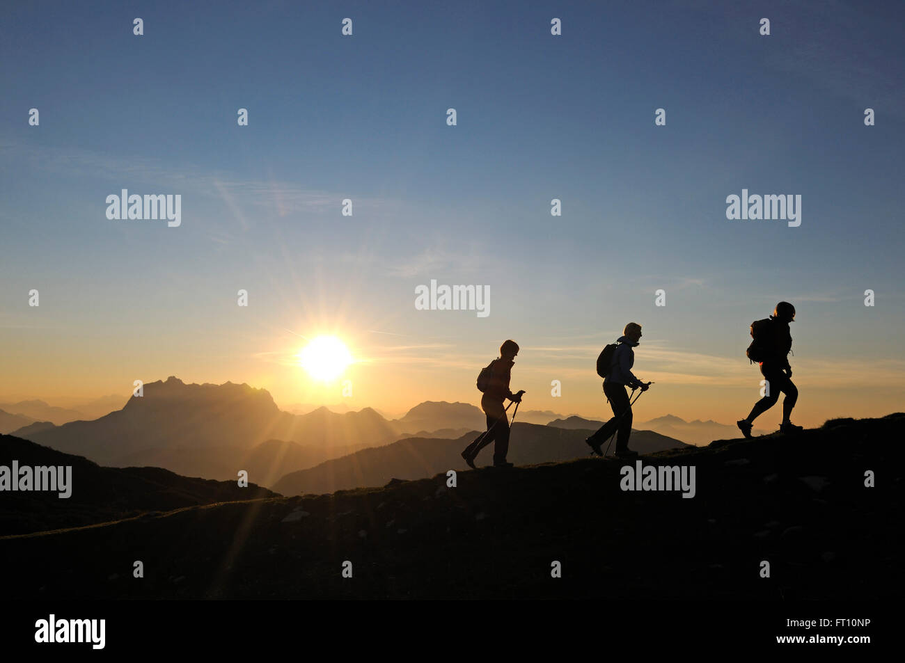 Female hikers on mount Steinplatte, Waidring, Tyrol, Austria Stock Photo
