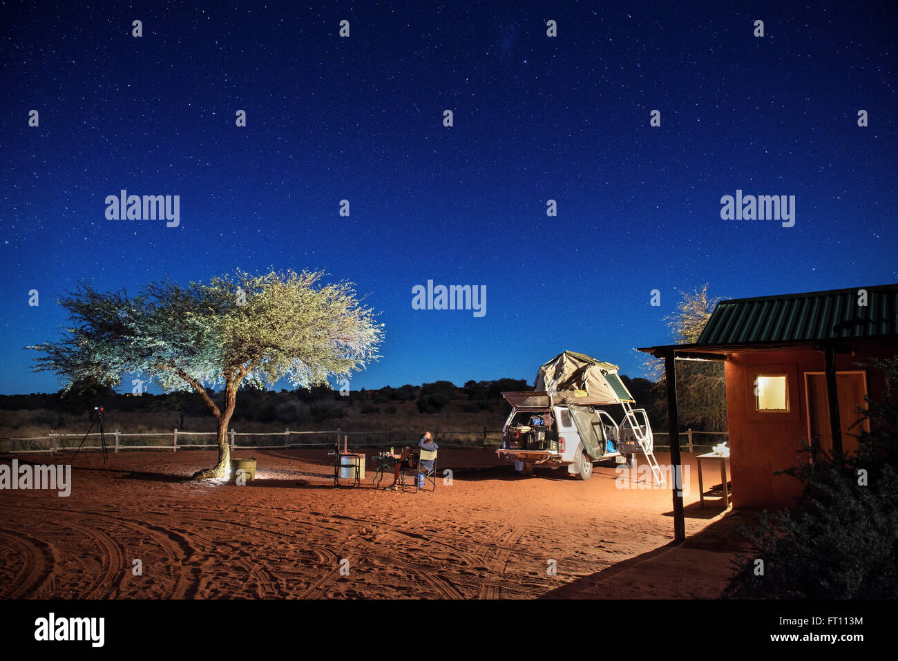 Bonfire under the stars in the desert camp in the Kalahari Desert, 4x4 rooftop  tent, Namibia, Africa Stock Photo - Alamy
