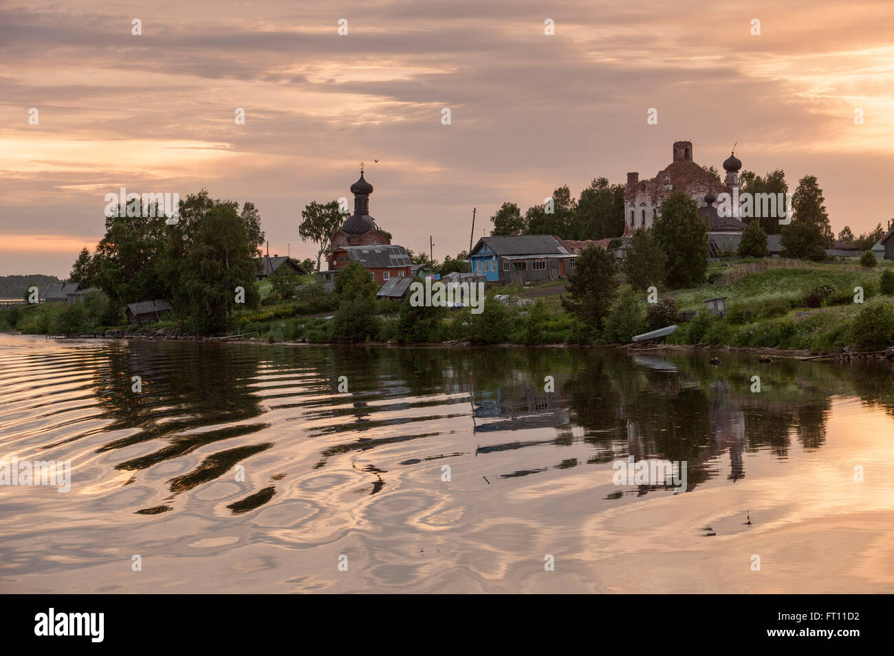 Buildings and churches at sunset, VolgaBaltic Canal, Russia Stock